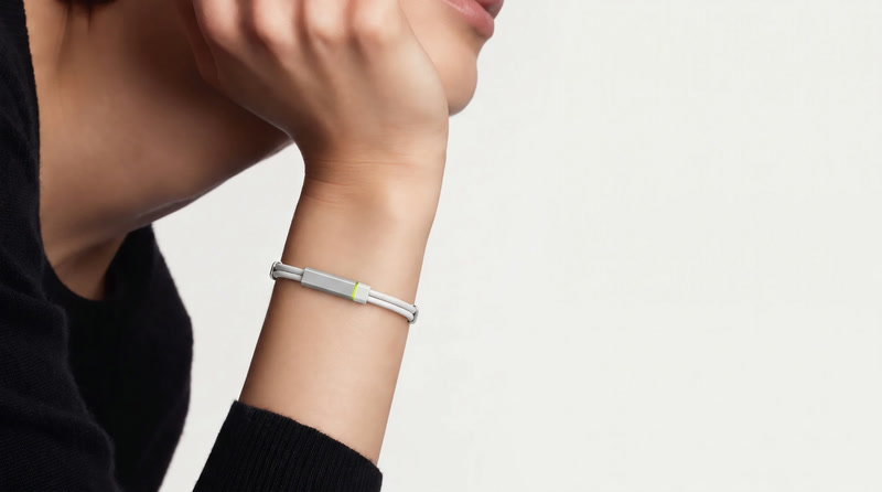 The white band on a wrist
